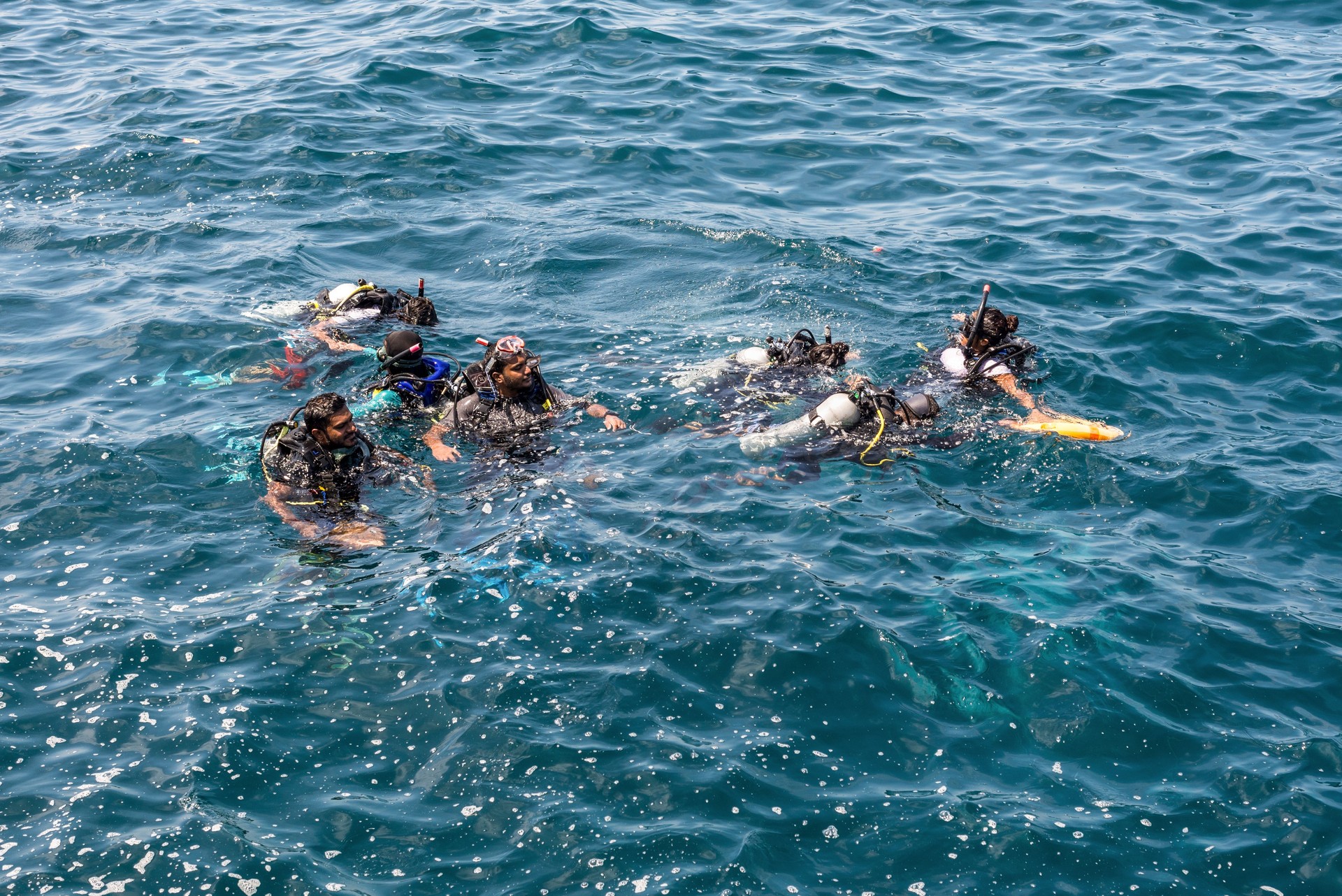 Scuba divers lessons near the shore in Male, Maldives